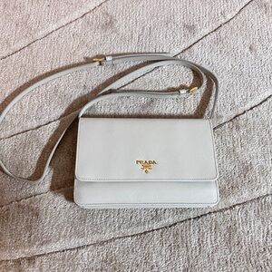 Prada white crossbody or clutch bag with detachable strap